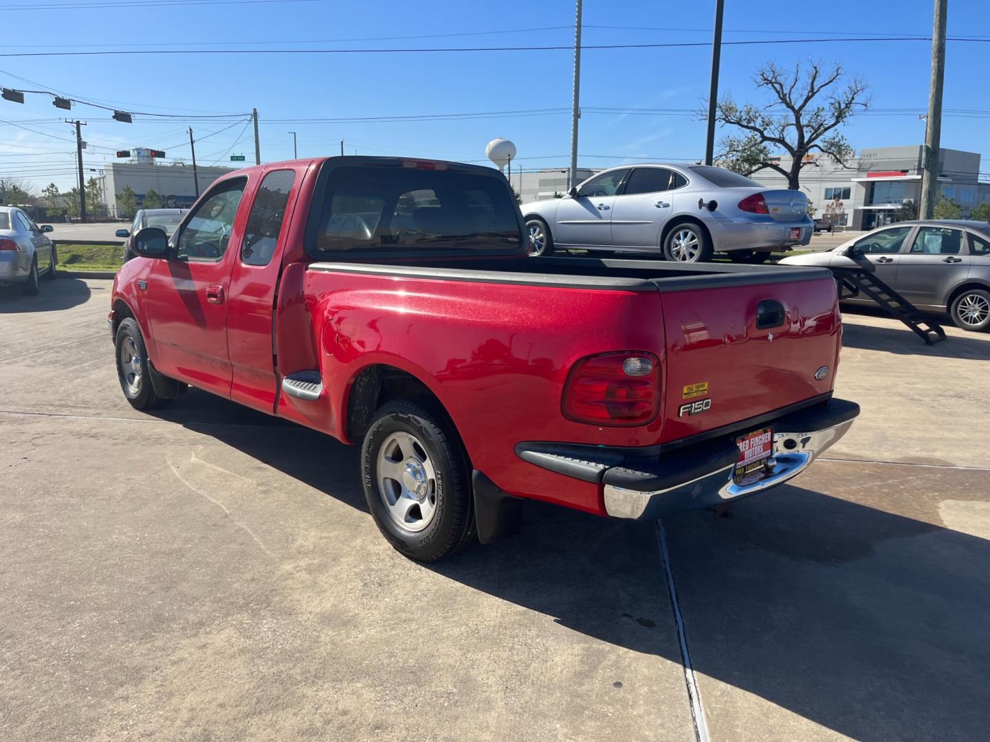 2003 red /TAN Ford F-150 XL SuperCab Flareside 2WD (1FTRX07213K) with an 4.2L V6 OHV 12V engine, Automatic transmission, located at 14700 Tomball Parkway 249, Houston, TX, 77086, (281) 444-2200, 29.928619, -95.504074 - Photo#4